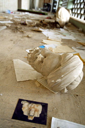 Baghdad museum : a beheaded sculpture inIraq's national  museum 