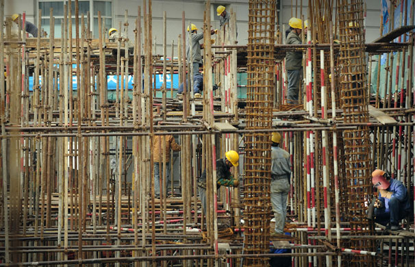 23 February 2009: Shanghai, China: Workers on a construction site