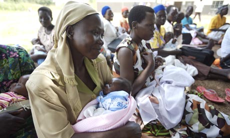 Mothers and babies waiting to be immunised in Katine