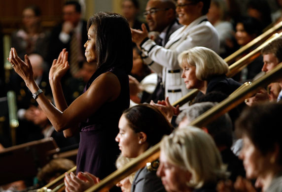Barack Obama address: Michelle Obama applauds her husband