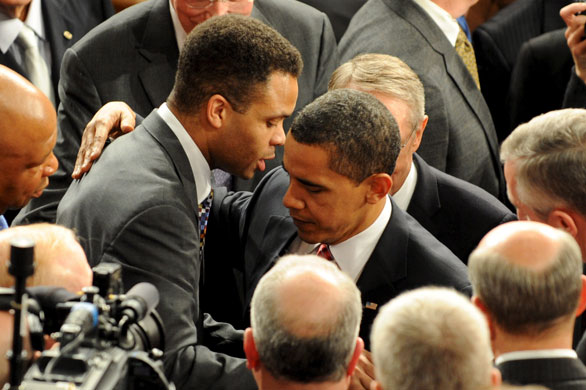 Barack Obama address: Barack Obama greets Jesse Jackson Jr after delivering his first address