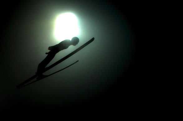 24sport: A ski jump competitor soars through the air