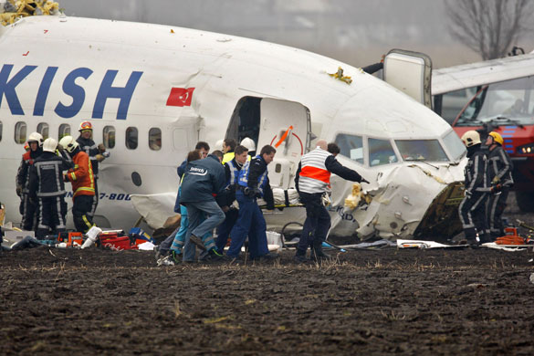 Turkish plane crash: Rescue workers help passengers after a Turkish Airlines plane crashed