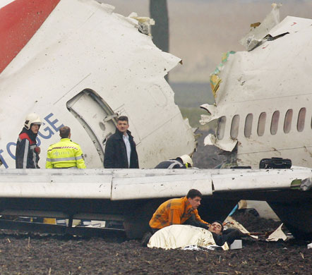 Turkish Airlines plane: An injured passenger receives treatment after Turkish Airlines plane crash
