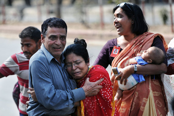 Bangladesh mutiny: Bangladeshi women hostages break down after their release in Dhaka.