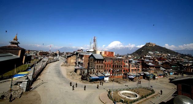 27 February 2009: Srinagar, India: Paramilitary soldiers stand guard outside Jamia Masjid