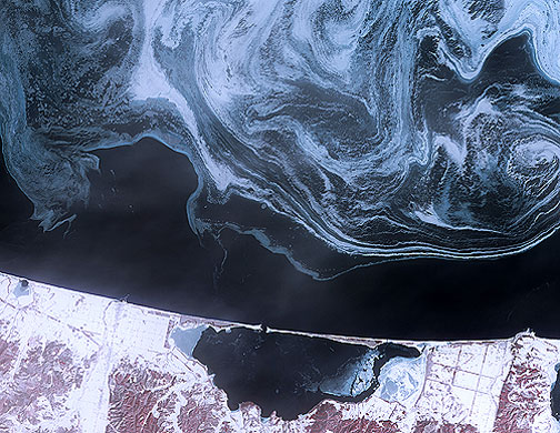 Satellite eye: Sea ice formed  swirls of blue and white in the Sea of Okhotsk, Japan