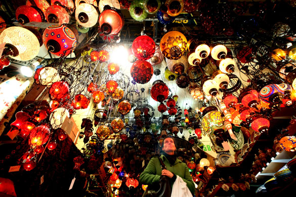 Gallery 3 February 2009: Istanbul, Turkey: A tourist visits a lamp store in the Egypt Bazaar