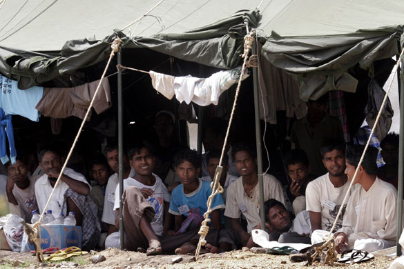 Gallery Rohingya refugees: Rohingya refugees sit in their encampment