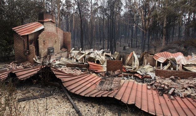 Gallery Australian fires: Burnt out houses smolder at Kinglake