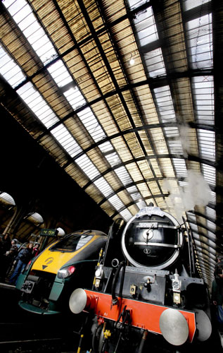 Gallery 8 February 2009: The steam locomotive Tornado next to a modern train at King's Cross station