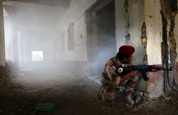 Gallery 9 February 2009: Basra, Iraq: An Iraqi soldier takes part in a training exercise