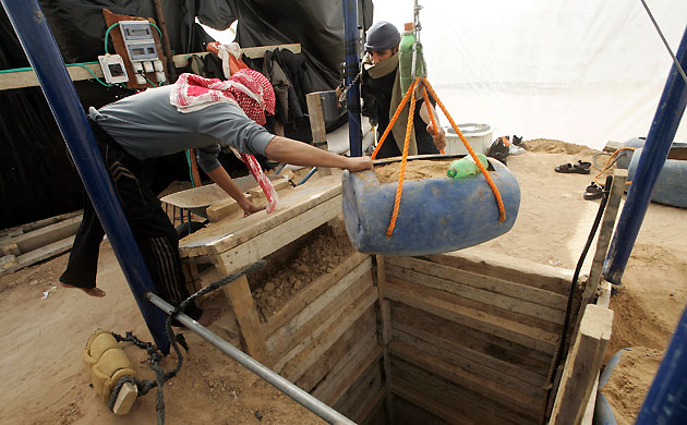 Gallery Tunnels under Gaza: Gaza tunnel Palestinians inspect and reconstruct Egypt-Gaza tunnels