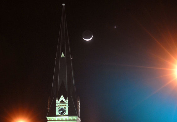 Watertown, Wisconsin, USA: A crescent moon and the planet Venus. 
