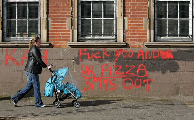 Northern Ireland shooting: Graffitti on the front of the Falls Road Library in west Belfast