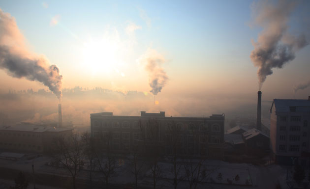 Heilongjiang Forest: Plumes of coal smoke rise up above Tangwanghe, China