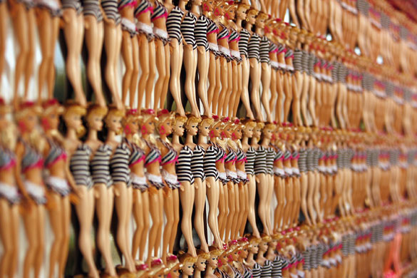 10 March 2009: Malibu, US: Barbie dolls are lined up on the wall at Barbie's 50th birthday