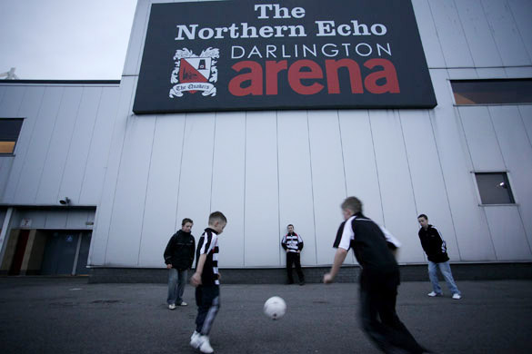 Darlington: Boys have a kick around outside the Darlington Arena