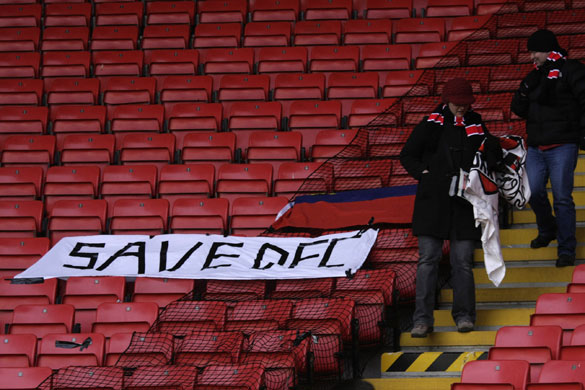 Darlington: Fans remove banners in support of the club after the match