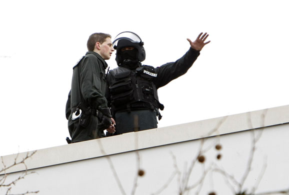 Germany shooting: Police officers stand on the roof of the Albertville school in Winnenden.