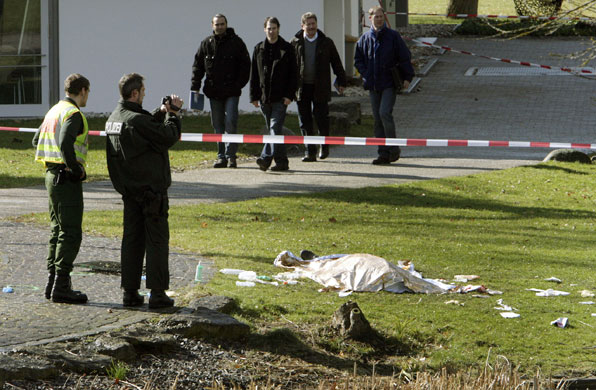 Germany school shooting: Police record the scene after a shooting at the Albertville school.