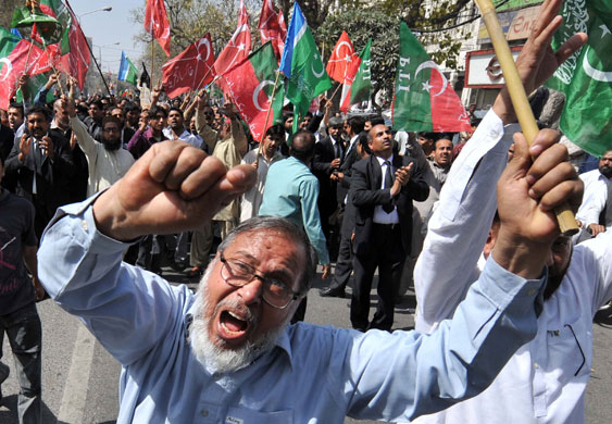 Pakistan lawyers protest: Pakistani lawyers and political party activists during a rally in Lahore.