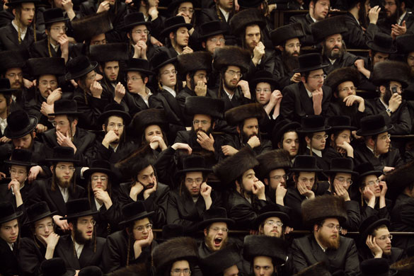 12 March 2009: Jerusalem, Israel: Ultra-Orthodox Jewish men gather at a yeshiva