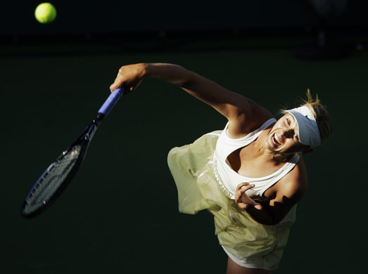 24sport: Maria Sharapova serves during the BNP Paribas Open tennis tournament