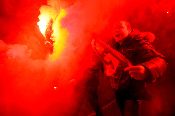 24 hours in pictures: Anti-Kremlin activists march during a protest in Moscow