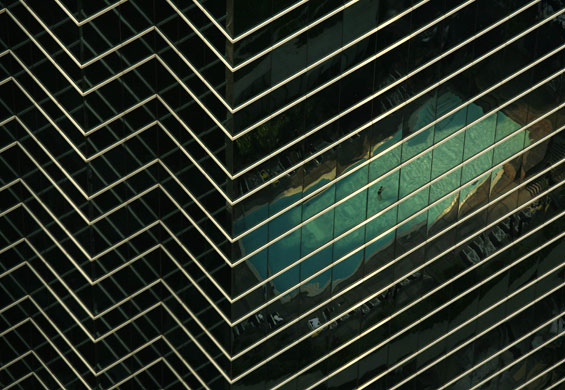 24 hours : A guest swimming at a hotel swimming pool  in Hong Kong