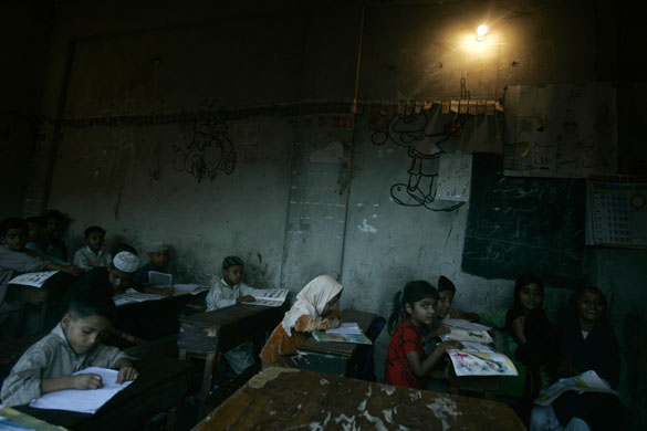 20 March 2009: Karachi, Pakistan: Children at an evening class in a makeshift classroom