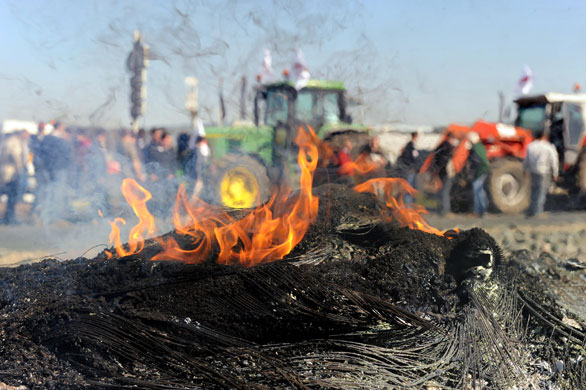 20 March 2009: Chartres, France: Farmers block the entrance to the city during a strike