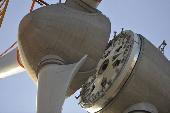 20 March 2009: Hamburg, Germany: Workers stand by to mount the propeller
