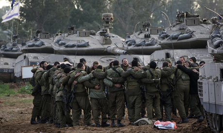 Israeli soldiers prepare to move towards northern Gaza