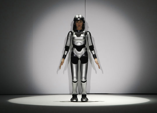 24 hours: HRP-4C humanoid robot on the catwalk  during Japan Fashion Week in Tokyo