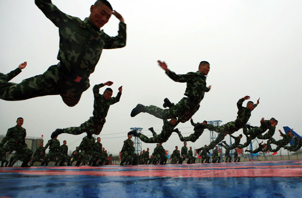 Eyewitness: Armed police officers during an anti-terrorism training exercise in Wuhan 