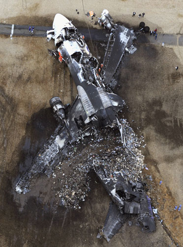 Eyewitness: The wreckage of a FexEx plane which crashed at Narita International Airport