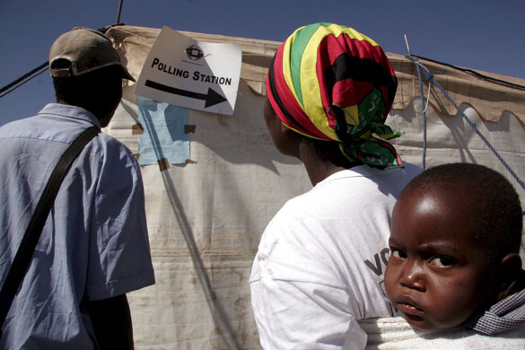 Chris McGreal's Africa: Voters check the results in run off presidential elections in Zimbabwe.
