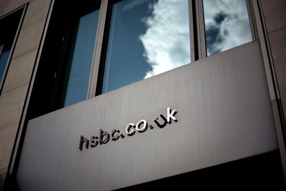 Week in Business: An HSBC logo above a branch in London.