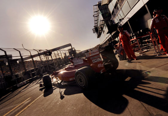 24sport: Felipe Massa exits the Ferrari garage during a practice session 