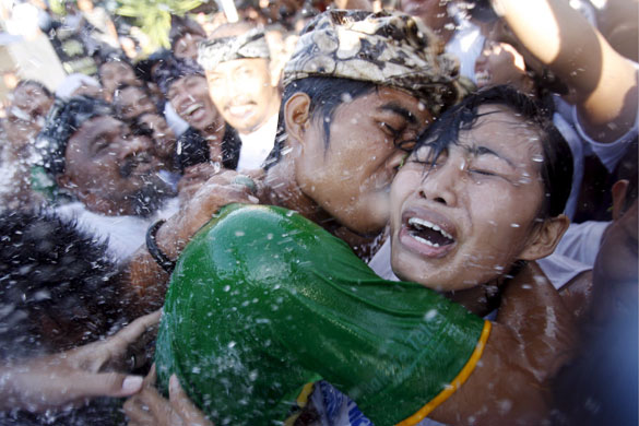 27 March 2009: Denpasar, Bali: Teenagers during the Kissing Festival