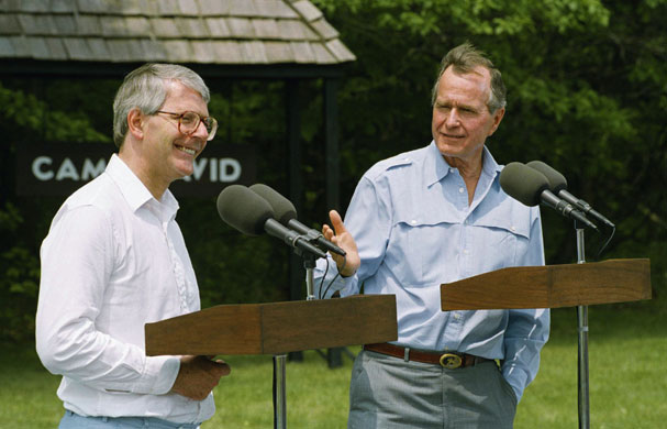 Presidents and PMs: President George H Bush gestures towards PM John Major at Camp David