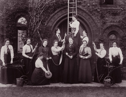 Firefighter uniforms: 1900: A group of female firefighters during a training session