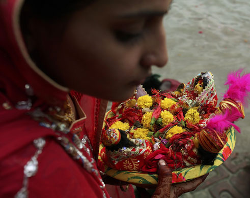 24 hours in pictures: Gangour festival in Kolkata