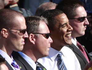 US Secret Service agents escort Barack Obama