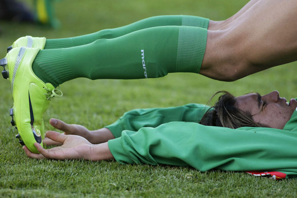 Sport: 24 hours: Marcelo Martins of Bolivia stretches during a training session