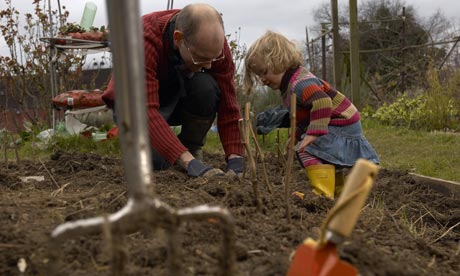 A man and a child gardening