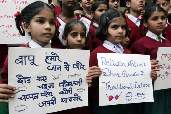 Mahatma Gandhi auction: Indian schoolchildren protest about the auction of Mahatma Gandhi's items.