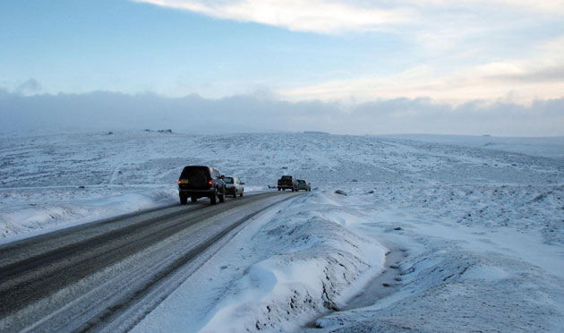 Snow in March: Vehicles make their way over Dartmoor, near Princetown