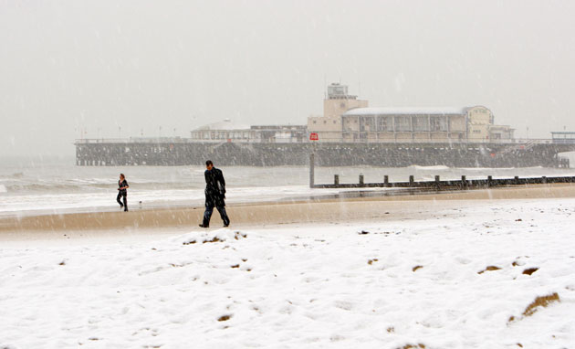 Snow in March: Snow settles on the beach at Bournemouth in Dorset, March 2009. 